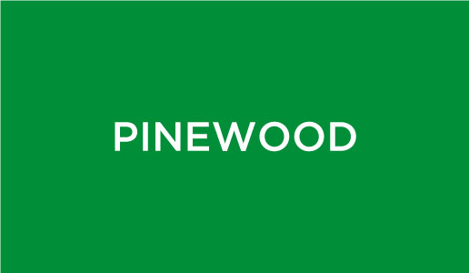 Pinewood on a green background.